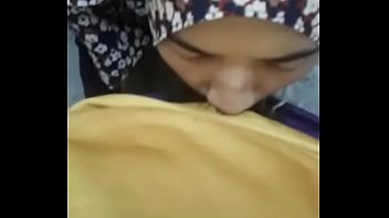 Hijabi Asian sucking dick