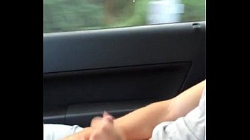 Masturbating next to her in the pasenger seat while on the highway until I cum as she talks dirty to