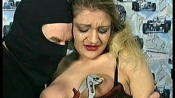 Crying slave is hit with a whip on her shaved pussy and got her nipples twisted with a piers