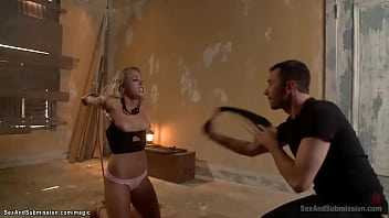 Blonde bound slave Zoey Monroe down on knees with hands in strappado gets whipped then laid on belly and spreaded gets anal fucked by James Deen