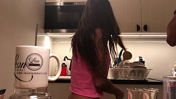 Braless girl in the kitchen no underwear